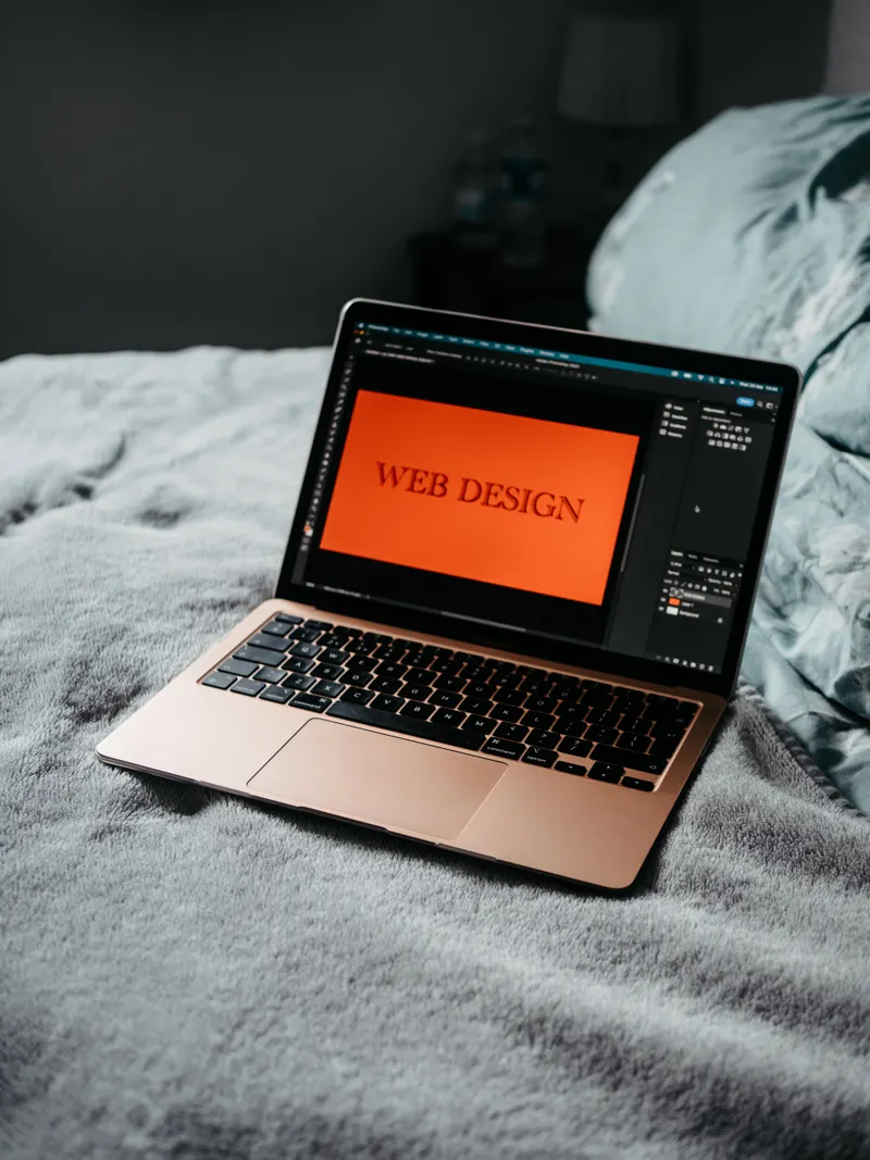 Custom website design shown on a laptop screen